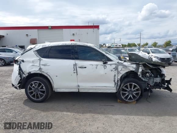 ✅ 2017 Mazda CX-5 Grand Touring • VIN: JM3KFADL2H0132844 • Лот: 43348862. Опубликован ранее на IAAI с пробегом 141 421 миль. Бесплатный доступ к архиву аукционных продаж из США и подробный отчёт об истории автомобиля на DreamBid. Изображение 13.