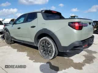 2022 Hyundai Santa Cruz SEL z VIN 5NTJB4AE7NH036621, wystawiony jako Copart lot #76979894 z przebiegiem 38 729 mil mil oraz Szkoda całkowita • Salvage title. Historia ofert i sprzedaży dostępna na DreamBid. Obrazek 2.