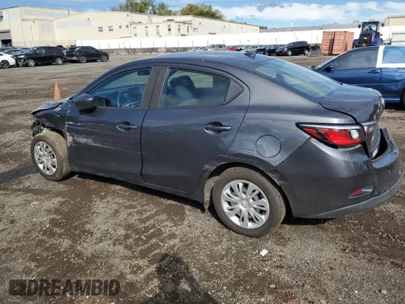 ✅ 2019 Toyota Yaris L • VIN: 3MYDLBYV6KY528432 • Lot: 81320025. Listed on Copart with 65,018 mi. Free auction sales archive from the USA and detailed vehicle history report at DreamBid. Image 2.