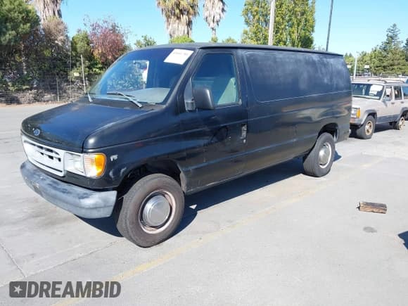 ✅ 1998 Ford Econoline Cargo Commercial • VIN: 1FTSE34L9WHA23271 • Lot: 43041780. Listed on IAAI with 222,252 mi. Free auction sales archive from the USA and detailed vehicle history report at DreamBid. Image 2.