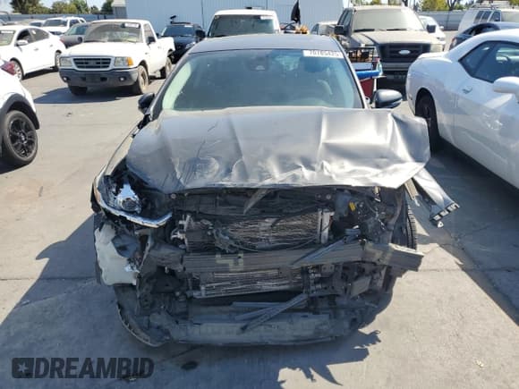 ✅ 2016 Ford Fusion Titanium Hybrid • VIN: 3FA6P0RU4GR125580 • Лот: 70785425. Опубликован ранее на Copart с пробегом 105 472 миль. Бесплатный доступ к архиву аукционных продаж из США и подробный отчёт об истории автомобиля на DreamBid. Изображение 5.