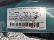 ✅ 2001 Mazda Protege LX • VIN: JM1BJ226510402231 • Lot: 46717595. Wystawiony na Copart z przebiegiem 154 138 mil. Bezpłatny archiwum sprzedaży aukcyjnych z USA i szczegółowy raport historii pojazdu na DreamBid. Zdjęcie 14.