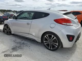 ✅ 2016 Hyundai Veloster Turbo • VIN: KMHTC6AEXGU255318 • Lot: 77101544. Wystawiony na Copart z przebiegiem Nie podano. Bezpłatny archiwum sprzedaży aukcyjnych z USA i szczegółowy raport historii pojazdu na DreamBid. Zdjęcie 2.