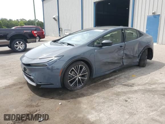 2024 Toyota Prius LE with VIN JTDACAAU5R3025104, listed as a Copart auction lot 65556565 with 18,003 mi miles and Salvage title. Bid and sale history available at DreamBid. Image 1.