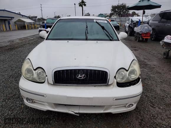 2004 Hyundai Sonata GLS с VIN KMHWF35H54A978952, выставлен на аукционе Copart как лот 49312725 с пробегом Не указан миль и Списание • Salvage title. История ставок и продаж доступна на DreamBid. Изображение 5.