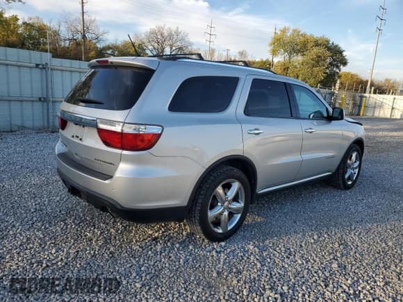 ✅ 2013 Dodge Durango Citadel • VIN: 1C4SDJET5DC648881 • Lot: 90414345. Listed on Copart with 200,227 mi. Free auction sales archive from the USA and detailed vehicle history report at DreamBid. Image 3.