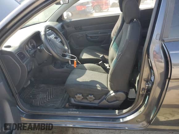 2007 Hyundai Accent GS with VIN KMHCM36CX7U029556, listed as a Copart auction lot 74939084 with 154,806 mi miles and Salvage title. Bid and sale history available at DreamBid. Image 7.