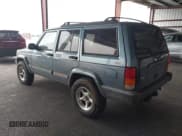 ✅ 1999 Jeep Cherokee Sport • VIN: 1J4FF68S4XL605305 • Lot: 43863356. Listed on IAAI with 232,672 mi. Free auction sales archive from the USA and detailed vehicle history report at DreamBid. Image 3.