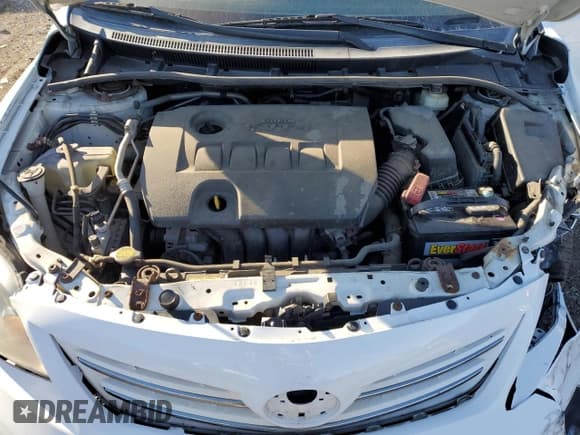 ✅ 2013 Toyota Corolla L • VIN: 5YFBU4EE7DP097718 • Lot: 82726635. Listed on Copart with 140,590 mi. Free auction sales archive from the USA and detailed vehicle history report at DreamBid. Image 11.