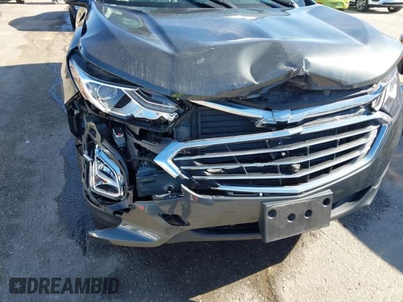 ✅ 2020 Chevrolet Equinox Premier • VIN: 3GNAXNEV9LS671723 • Lot: 43576549. Wystawiony na IAAI z przebiegiem 71 876 mil. Bezpłatny archiwum sprzedaży aukcyjnych z USA i szczegółowy raport historii pojazdu na DreamBid. Zdjęcie 6.