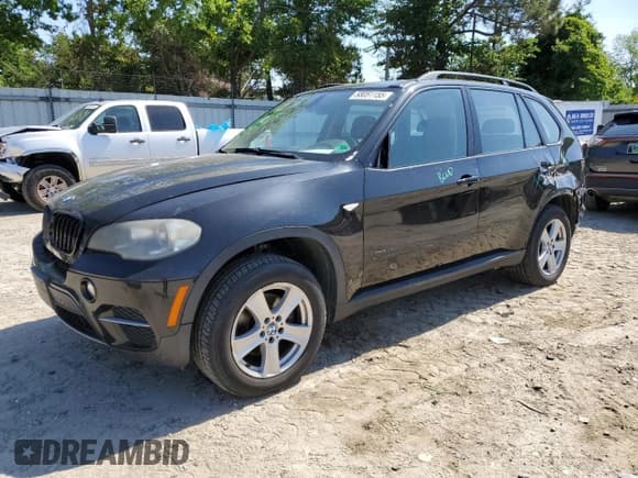✅ 2012 BMW X5 35i • VIN: 5UXZV4C52CL748838 • Lot: 58051155. Listed on Copart with 224,088 mi. Free auction sales archive from the USA and detailed vehicle history report at DreamBid. Image 1.