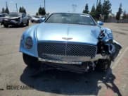 ✅ 2022 Bentley Continental GT GT V8 • VIN: SCBCG2ZG4NC094932 • Lot: 64056355. Listed on Copart with 6,596 mi. Free auction sales archive from the USA and detailed vehicle history report at DreamBid. Image 5.