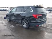 ✅ 2020 Honda Pilot EX-L • VIN: 5FNYF6H50LB022798 • Lot: 41592012. Listed on IAAI with 67,045 mi. Free auction sales archive from the USA and detailed vehicle history report at DreamBid. Image 3.