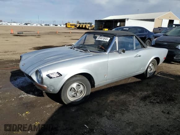 ✅ 1974 FIAT 124 • VIN: 124CS10083513 • Лот: 88461645. Опубликован ранее на Copart с пробегом 127 228 миль. Бесплатный доступ к архиву аукционных продаж из США и подробный отчёт об истории автомобиля на DreamBid. Изображение 1.