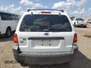 ✅ 2005 Ford Escape XLT • VIN: 1FMYU93145DA04306 • Lot: 56209425. Listed on Copart with 124,956 mi. Free auction sales archive from the USA and detailed vehicle history report at DreamBid. Image 6.