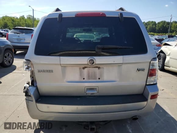 ✅ 2011 Mercury Mariner • VIN: 4M2CN9BG7BKJ06587 • Lot: 85033504. Listed on Copart with 115,105 mi. Free auction sales archive from the USA and detailed vehicle history report at DreamBid. Image 6.