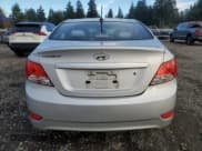 ✅ 2013 Hyundai Accent GLS • VIN: KMHCT4AE4DU570146 • Lot: 93766985. Listed on Copart with 98,825 mi. Free auction sales archive from the USA and detailed vehicle history report at DreamBid. Image 6.