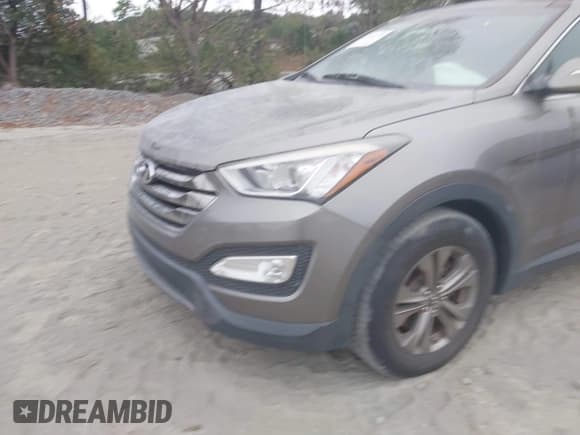 ✅ 2014 Hyundai Santa Fe • VIN: 5XYZUDLB0EG150479 • Lot: 43361152. Listed on IAAI with 163,969 mi. Free auction sales archive from the USA and detailed vehicle history report at DreamBid. Image 6.