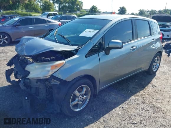 ✅ 2014 Nissan Note S • VIN: 3N1CE2CP7EL416255 • Lot: 42539409. Wystawiony na IAAI z przebiegiem 179 074 mil. Bezpłatny archiwum sprzedaży aukcyjnych z USA i szczegółowy raport historii pojazdu na DreamBid. Zdjęcie 17.