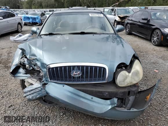 2004 Hyundai Sonata GLS z VIN KMHWF35H54A045598, wystawiony jako Copart lot #86837924 z przebiegiem Nie podano mil oraz Szkoda całkowita • Salvage title. Historia ofert i sprzedaży dostępna na DreamBid. Obrazek 5.