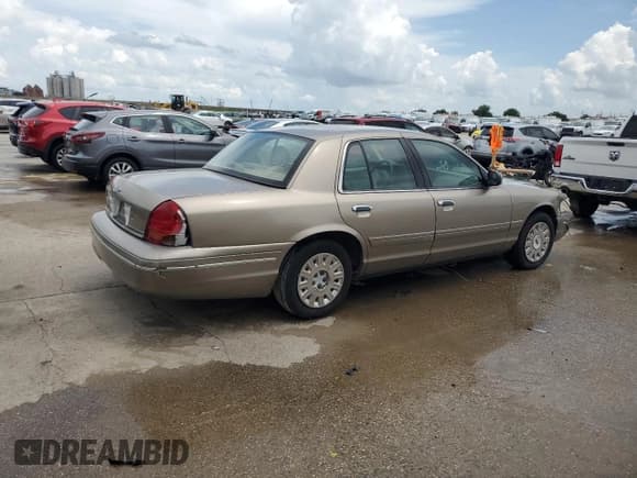 ✅ 2003 Ford Crown Victoria Standard • VIN: 2FAFP73W03X156758 • Lot: 61150295. Listed on Copart with 116,063 mi. Free auction sales archive from the USA and detailed vehicle history report at DreamBid. Image 3.