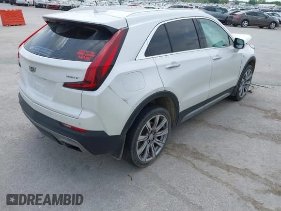 ✅ 2022 Cadillac XT4 FWD Premium Luxury • VIN: 1GYFZCR44NF144494 • Lot: 42072181. Listed on IAAI with 41,891 mi. Free auction sales archive from the USA and detailed vehicle history report at DreamBid. Image 4.
