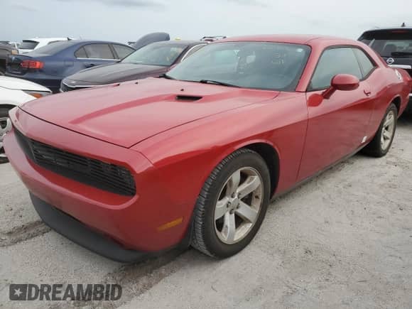 2012 Dodge Challenger SXT z VIN 2C3CDYAG9CH210824, wystawiony jako Copart lot #76201764 z przebiegiem 97 698 mil mil oraz Nie do naprawy • Non repairable. Historia ofert i sprzedaży dostępna na DreamBid. Obrazek 1.