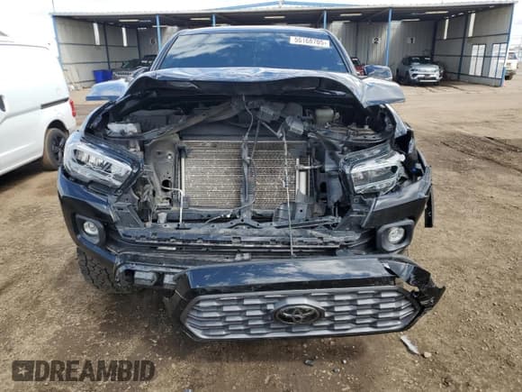 ✅ 2023 Toyota Tacoma SR • VIN: 3TMCZ5AN8PM538320 • Lot: 55168705. Listed on Copart with 48,643 mi. Free auction sales archive from the USA and detailed vehicle history report at DreamBid. Image 5.