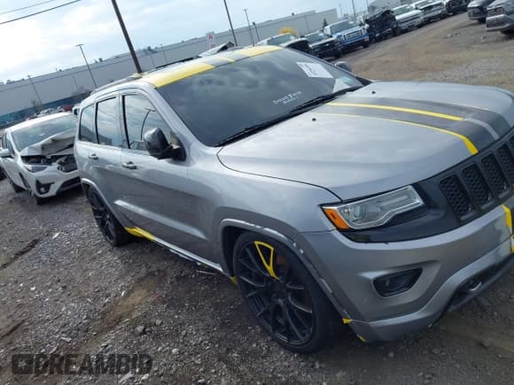 ✅ 2014 Jeep Grand Cherokee Overland • VIN: 1C4RJFCT6EC404326 • Lot: 43296550. Listed on IAAI with 161,846 mi. Free auction sales archive from the USA and detailed vehicle history report at DreamBid. Image 1.