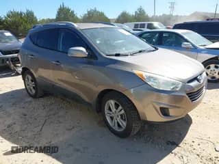 2010 Hyundai Tucson Limited with VIN KM8JU3AC6AU071745, listed as a IAAI auction lot 43224589 with 158,459 mi miles and . Bid and sale history available at DreamBid. Image 1.