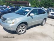 ✅ 2007 Lexus RX 350 • VIN: 2T2HK31UX7C024222 • Lot: 42245924. Listed on IAAI with 228,442 mi. Free auction sales archive from the USA and detailed vehicle history report at DreamBid. Image 2.