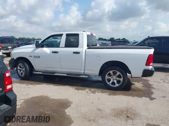 2015 Ram 1500 Express with VIN 1C6RR7FT3FS504568, listed as a IAAI auction lot 42410901 with 207,307 mi miles and . Bid and sale history available at DreamBid. Image 14.
