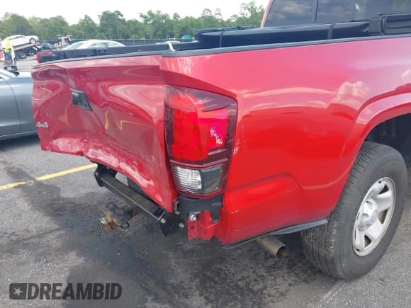 ✅ 2022 Toyota Tacoma SR • VIN: 3TYSX5EN1NT014391 • Lot: 42470136. Listed on IAAI with 31,720 mi. Free auction sales archive from the USA and detailed vehicle history report at DreamBid. Image 19.