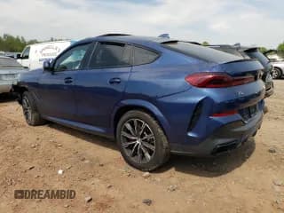 ✅ 2022 BMW X6 M50i • VIN: 5UXCY8C09N9J35799 • Лот: 51283093. Опубликован ранее на Copart с пробегом Не указан. Бесплатный доступ к архиву аукционных продаж из США и подробный отчёт об истории автомобиля на DreamBid. Изображение 2.