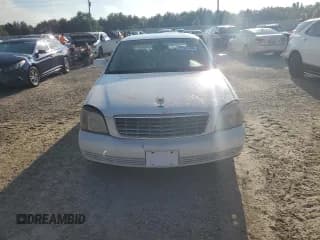 ✅ 2002 Cadillac DeVille • VIN: 1G6KD54YX2U104701 • Lot: 74187264. Listed on Copart with 205,805 mi. Free auction sales archive from the USA and detailed vehicle history report at DreamBid. Image 5.