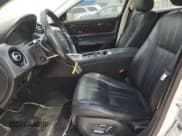 ✅ 2015 Jaguar XJ • VIN: SAJWJ1CD1F8V75232 • Lot: 57605685. Listed on Copart with 146,314 mi. Free auction sales archive from the USA and detailed vehicle history report at DreamBid. Image 7.