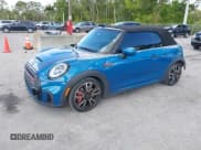 ✅ 2022 MINI Convertible John Cooper Works • VIN: WMW63DL0XN3P15732 • Lot: 41807134. Listed on IAAI with 52,631 mi. Free auction sales archive from the USA and detailed vehicle history report at DreamBid. Image 2.