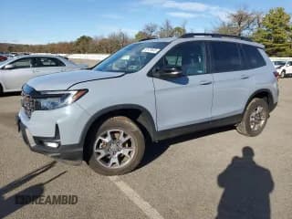 ✅ 2023 Honda Passport TrailSport • VIN: 5FNYF8H64PB035984 • Lot: 82479645. Listed on Copart with 29,289 mi. Free auction sales archive from the USA and detailed vehicle history report at DreamBid. Image 1.