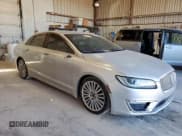 ✅ 2017 Lincoln MKZ Reserve • VIN: 3LN6L5E96HR605296 • Lot: 91032705. Wystawiony na Copart z przebiegiem 143 023 mil. Bezpłatny archiwum sprzedaży aukcyjnych z USA i szczegółowy raport historii pojazdu na DreamBid. Zdjęcie 4.
