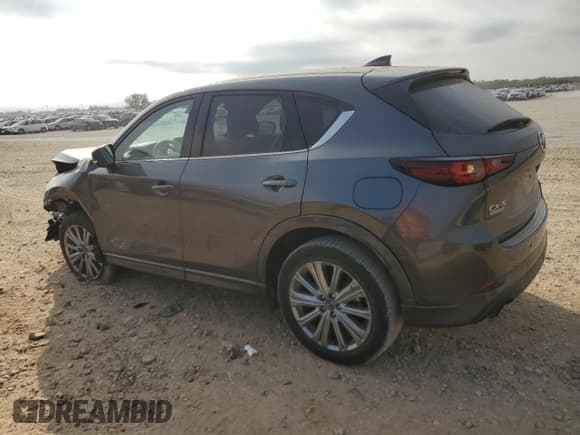 ✅ 2023 Mazda CX-5 Signature • VIN: JM3KFBXY2P0131107 • Лот: 87112295. Опубликован ранее на Copart с пробегом Не указан. Бесплатный доступ к архиву аукционных продаж из США и подробный отчёт об истории автомобиля на DreamBid. Изображение 2.
