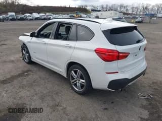 ✅ 2018 BMW X1 xDrive28i • VIN: WBXHT3C32J5F88317 • Lot: 43710846. Wystawiony na IAAI z przebiegiem 54 681 mil. Bezpłatny archiwum sprzedaży aukcyjnych z USA i szczegółowy raport historii pojazdu na DreamBid. Zdjęcie 3.