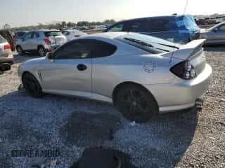 2004 Hyundai Tiburon GT с VIN KMHHN65F94U153507, выставлен на аукционе Copart как лот 66108085 с пробегом 113 413 миль миль и Списание • Salvage title. История ставок и продаж доступна на DreamBid. Изображение 2.