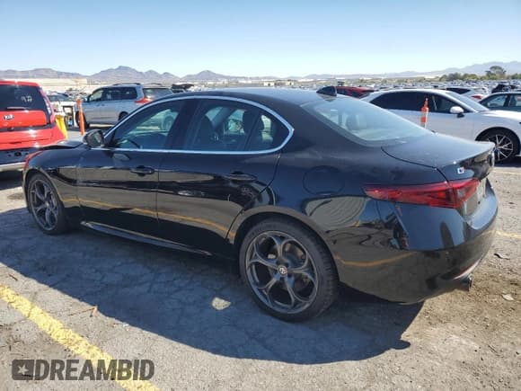 ✅ 2018 Alfa Romeo Giulia Ti Sport • VIN: ZARFAEEN9J7569954 • Лот: 80119065. Опубликован ранее на Copart с пробегом 51 502 миль. Бесплатный доступ к архиву аукционных продаж из США и подробный отчёт об истории автомобиля на DreamBid. Изображение 2.
