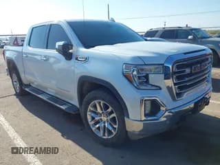 ✅ 2021 GMC Sierra 1500 SLT • VIN: 3GTU9DED6MG167121 • Lot: 43002512. Listed on IAAI with 129,998 mi. Free auction sales archive from the USA and detailed vehicle history report at DreamBid. Image 1.