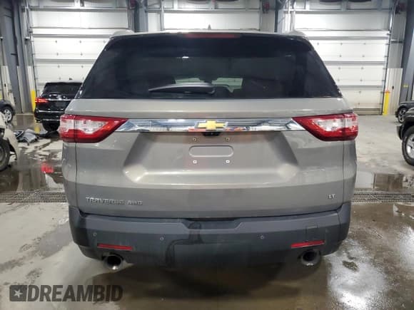 ✅ 2018 Chevrolet Traverse LT • VIN: 1GNEVHKW7JJ112143 • Lot: 81086695. Listed on Copart with 199,471 mi. Free auction sales archive from the USA and detailed vehicle history report at DreamBid. Image 6.