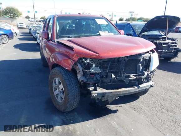 ✅ 2012 Nissan Frontier Pro-4X • VIN: 1N6AD0EV6CC433903 • Lot: 41329828. Listed on IAAI with 209,345 mi. Free auction sales archive from the USA and detailed vehicle history report at DreamBid. Image 1.