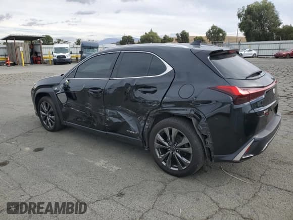 ✅ 2021 Lexus UX 250h F Sport • VIN: JTHE9JBH3M2053479 • Лот: 85153595. Опубликован ранее на Copart с пробегом 119 724 миль. Бесплатный доступ к архиву аукционных продаж из США и подробный отчёт об истории автомобиля на DreamBid. Изображение 2.