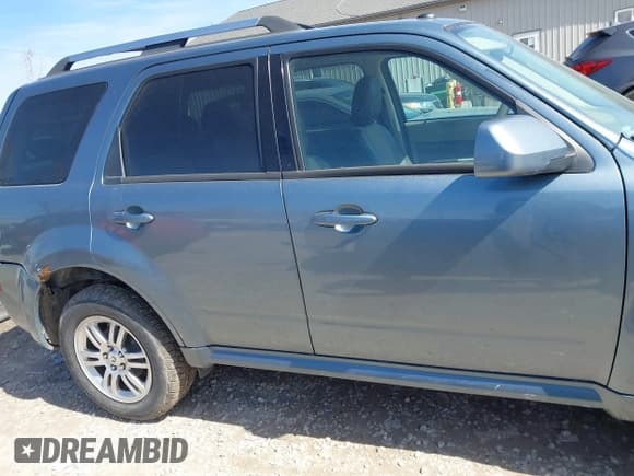 ✅ 2010 Mercury Mariner Premier • VIN: 4M2CN9HG4AKJ00851 • Lot: 41806070. Listed on IAAI with 186,635 mi. Free auction sales archive from the USA and detailed vehicle history report at DreamBid. Image 13.