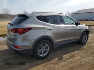 ✅ 2018 Hyundai Santa Fe 2.4L • VIN: 5NMZUDLB1JH067059 • Лот: 44322014. Опубликован ранее на Copart с пробегом 103 429 миль. Бесплатный доступ к архиву аукционных продаж из США и подробный отчёт об истории автомобиля на DreamBid. Изображение 3.