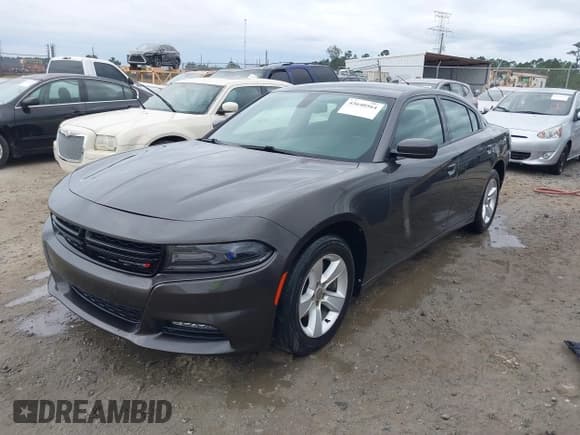✅ 2015 Dodge Charger SXT • VIN: 2C3CDXHG5FH852204 • Lot: 43640564. Listed on IAAI with 175,431 mi. Free auction sales archive from the USA and detailed vehicle history report at DreamBid. Image 2.
